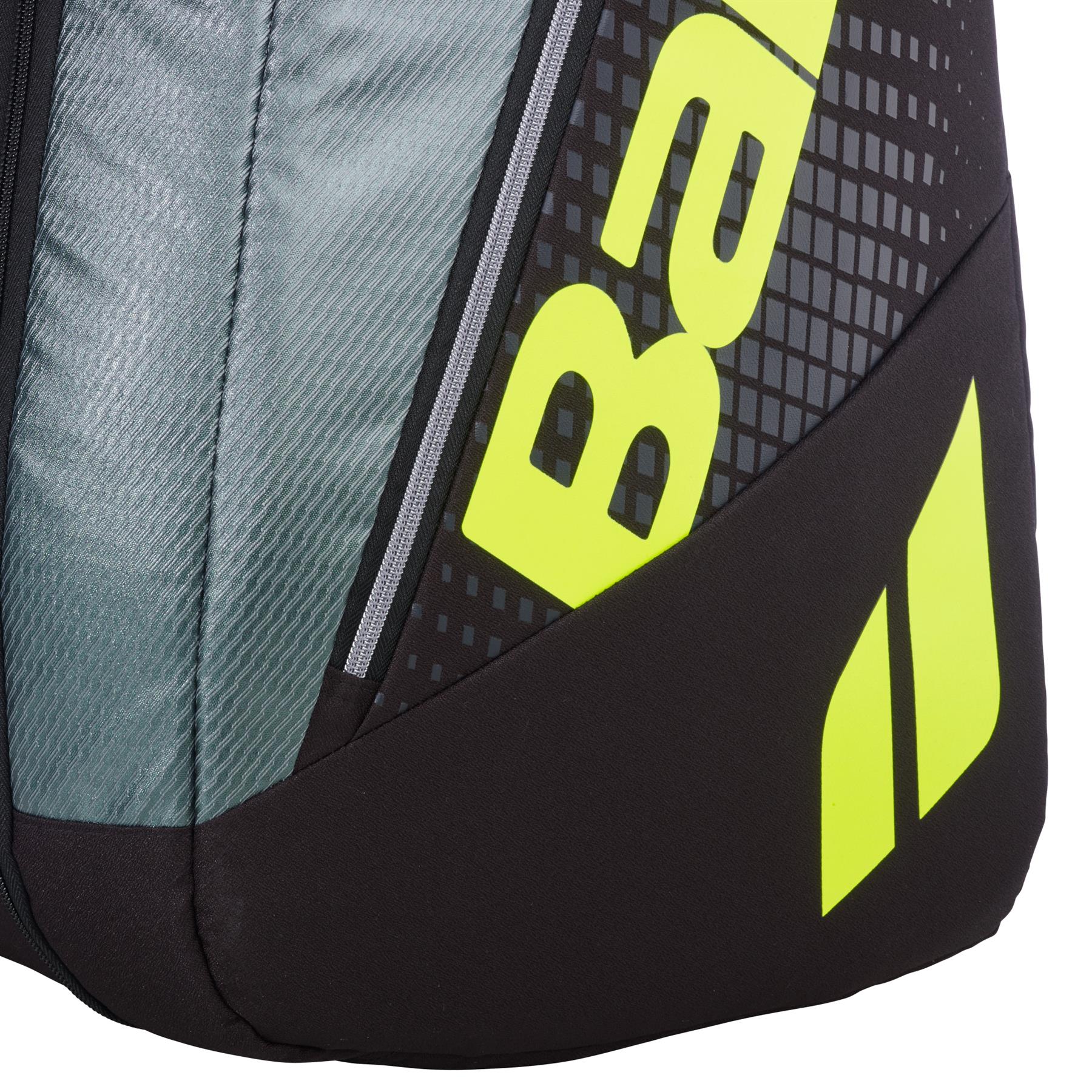 Close-up of the Babolat RH12 Pure Aero 12 Racket Badminton Bag in grey and yellow, featuring a black and gray textured design, bold yellow logo and text, plus a vertical center zipper.