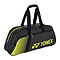 The Yonex 82431WEX Active Tournament Badminton Bag in black/lime features a zippered main compartment, side pocket, sturdy carrying handles, and prominently displays the Yonex logo and stripes—a stylish choice for players wanting to stand out at tournaments.