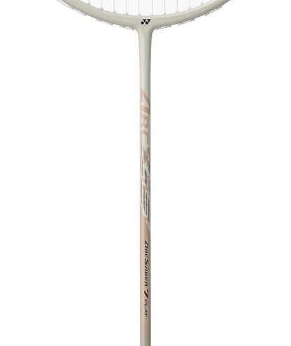 Close-up of the Yonex Arcsaber 7 Play 4U Badminton Racket’s shaft and lower head, showing its ISOMETRIC frame, Yonex branding, and light beige color with silver and orange accents.