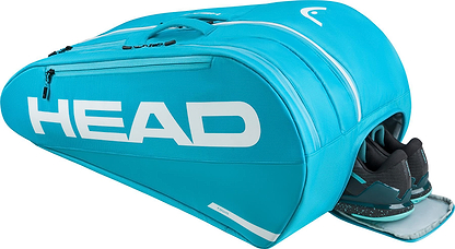 The HEAD Tour 9 Racket Badminton Bag L - Blue by HEAD features a spacious design with multiple compartments, a white logo, and a ventilated shoe pocket where black and teal sneakers are partially visible.