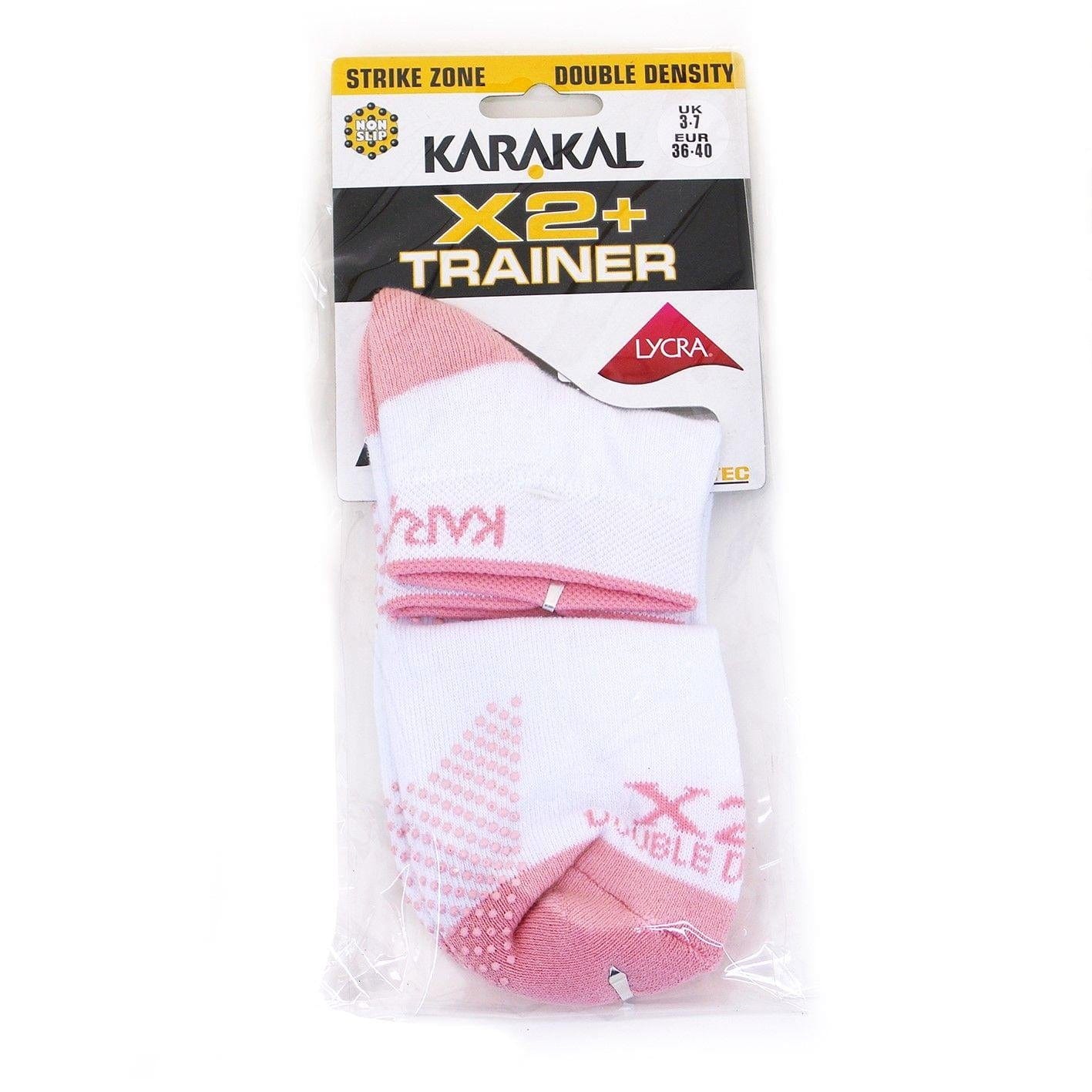 A package of Karakal X2+ Women's Technical Trainer Badminton Socks in white and pink, featuring anti-slip technology, available in UK sizes 3 to 7.