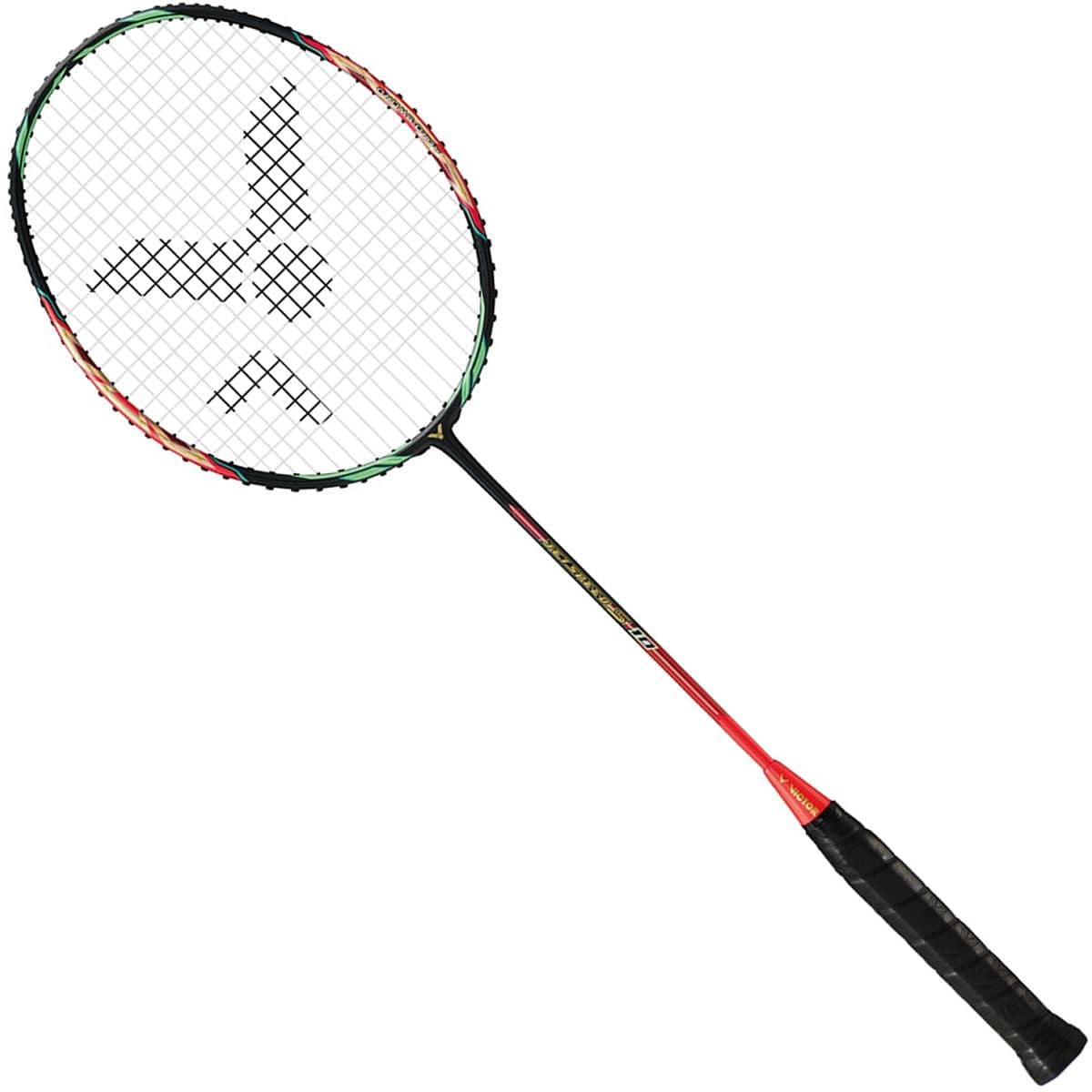 Introducing the Victor Jetspeed S 10 Q Badminton Racket by Victor, featuring a black handle and a striking red and black shaft. Crafted with Pyrofil Carbon Fibre for optimal lightweight handling, the racket's head boasts a multicolored lining with intersecting strings that form an intricate logo pattern.