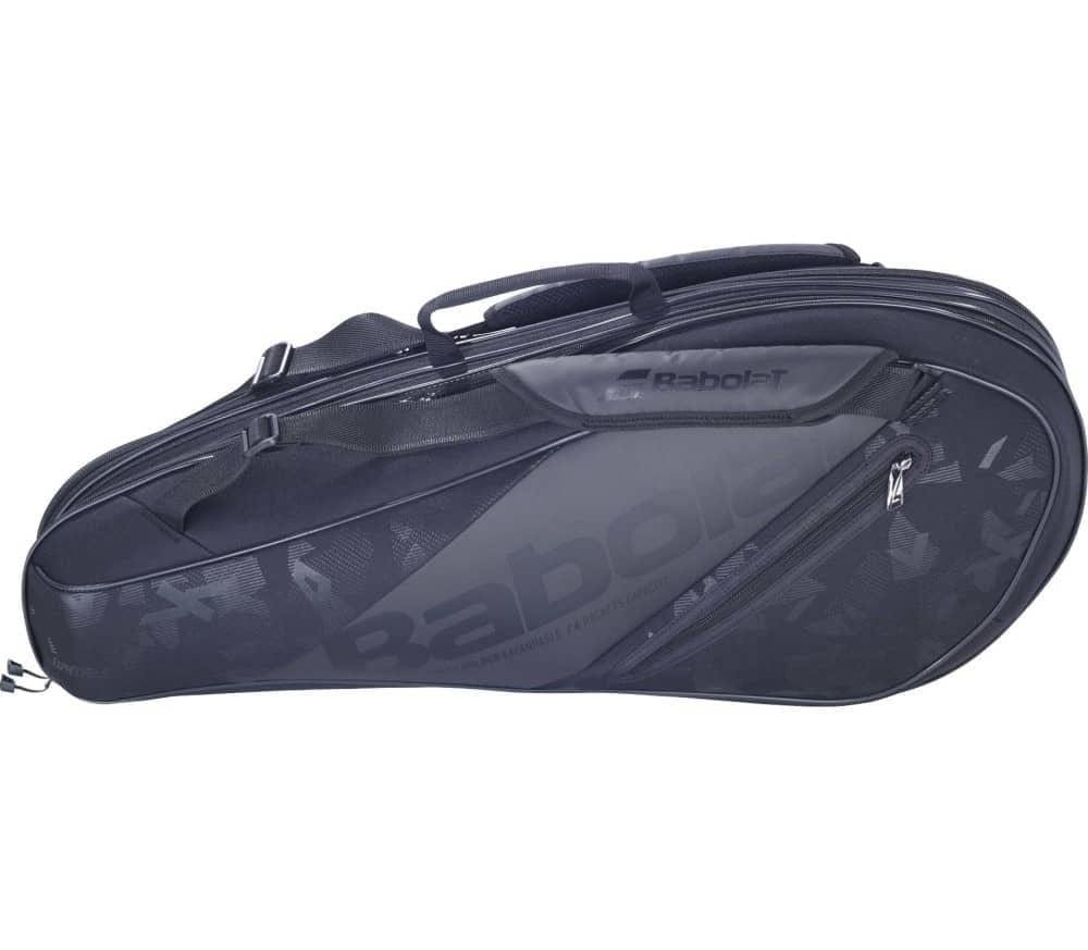 The Babolat Expand Team 9 Racket Bag Black features a sleek design, offering space for up to 9 rackets across two zippered compartments to store your gear. It has padded shoulder straps for comfortable transport, with the Babolat logo prominently displayed on the side.
