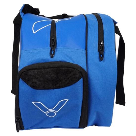 A Victor Doublethermo Badminton Bag 9111 in blue, featuring black zippers and a black front pocket. This bag is perfect for carrying badminton rackets and has a white logo that resembles a stylized "V" on both the top flap and the front pocket. The shoulder strap is also visible.
