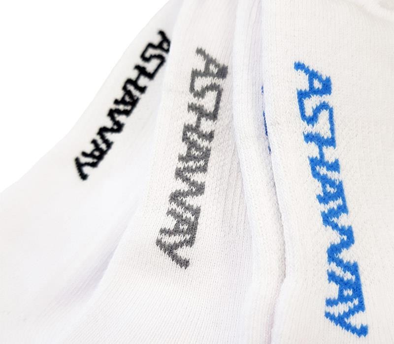 Close-up of the Ashaway Badminton Trainer Socks - White 3 Pack, each pair with "ASHAWAY" stitched near the top in black, gray, and blue, combining comfort and performance style.