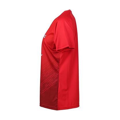 Side view of the FZ Forza Bali Red Girls/Women's Badminton T-Shirt in vibrant red, featuring a subtle pattern on the left side. This athletic tee from FZ Forza boasts short sleeves, a round neckline, and is designed to be stretch resistant for lasting durability.