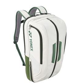 The Yonex 02312EX Expert Backpack, available in white and moss green, boasts a sleek design with multiple zippers. Featuring green-accented straps and the Yonex logo on the side, this high-quality luggage provides a versatile alternative for those on the go.