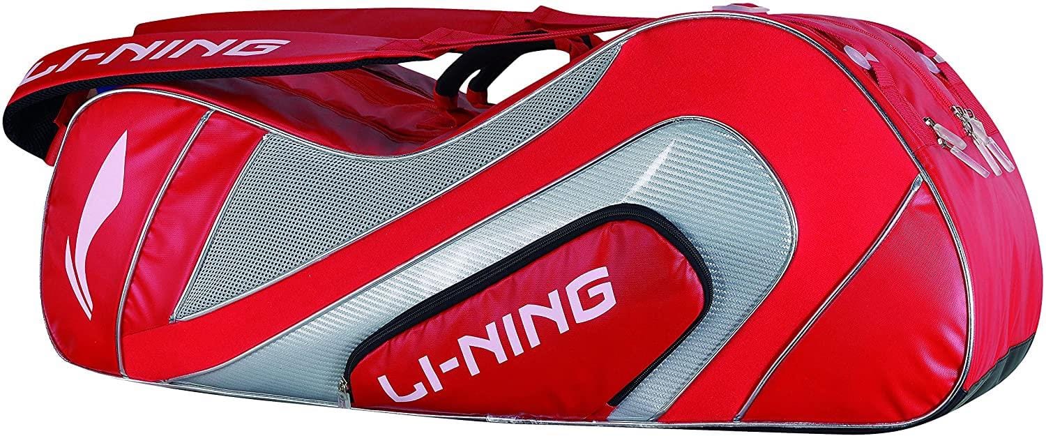 A Li-Ning National Team 6 Piece Racket Bag in red and silver polyester, featuring multiple compartments and a convenient shoulder strap, prominently displaying the iconic Li-Ning logo.
