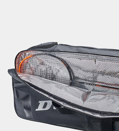 The Dunlop Elite Rectangular Badminton Bag - Black reveals a sleek design with a visible Dunlop logo. Inside, it has a mesh compartment holding a partially visible tennis racket and includes a thermo-insulated section to optimally protect gear.