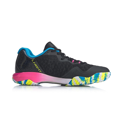 A side view of the Li-Ning Dagger II SE Men's Badminton Shoe in black with blue, yellow, and pink accents. Tailored for badminton enthusiasts, the shoe's sole showcases a vibrant geometric pattern and incorporates Drive Foam technology to enhance performance. The word "LAVERTI" is printed on the side.