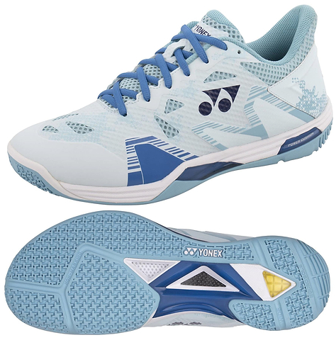 The Yonex Power Cushion Eclipsion Z3 Wide Men's Badminton Shoes in light blue feature blue laces and subtle geometric patterns for enhanced stability, with a textured sole showcasing grooves for grip and the brand logo prominently on the side and sole.