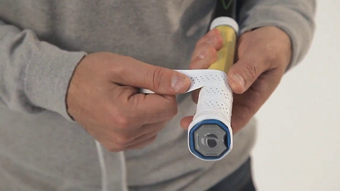 Applying new grip to a racket