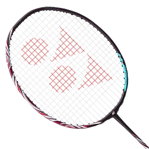 The Yonex Astrox 100 ZZ Kurenai badminton racket in Crimson Red boasts a distinct ISOMETRIC black frame with strings adorned by an eye-catching red triangular logo, accompanied by a Hyper Slim Shaft to boost performance.