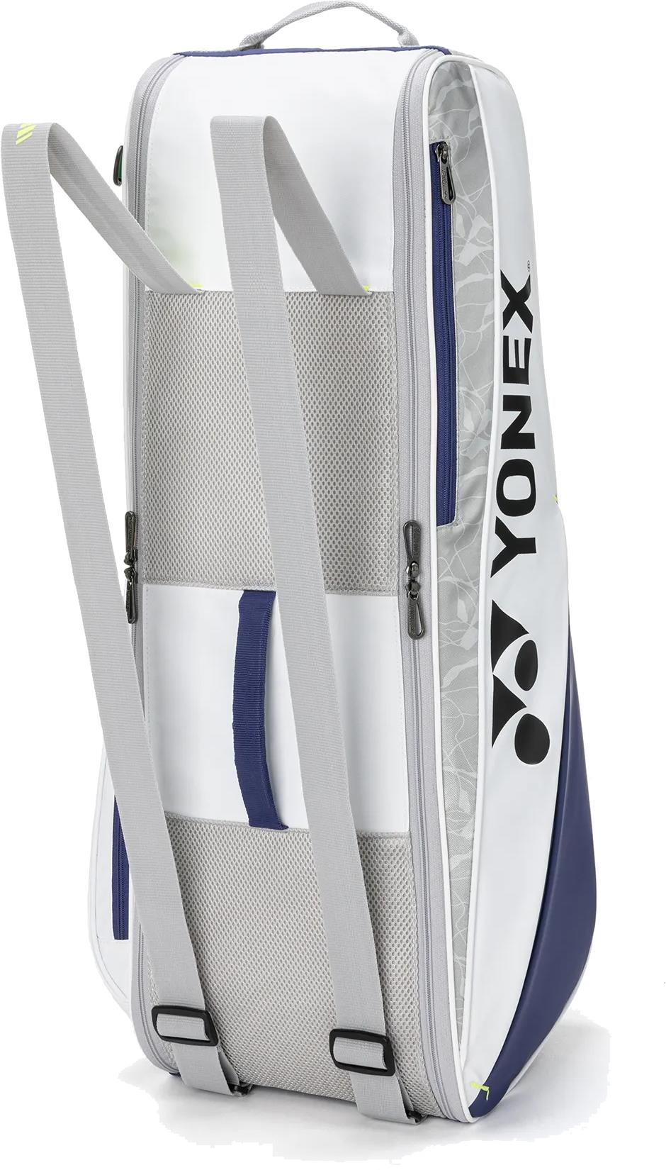 The Yonex BA52526EX Club 6 Racket Badminton Bag in white and blue features gray adjustable shoulder straps, mesh pocket, side zipper compartments, and a vertical Yonex logo—ideal for carrying your badminton gear.