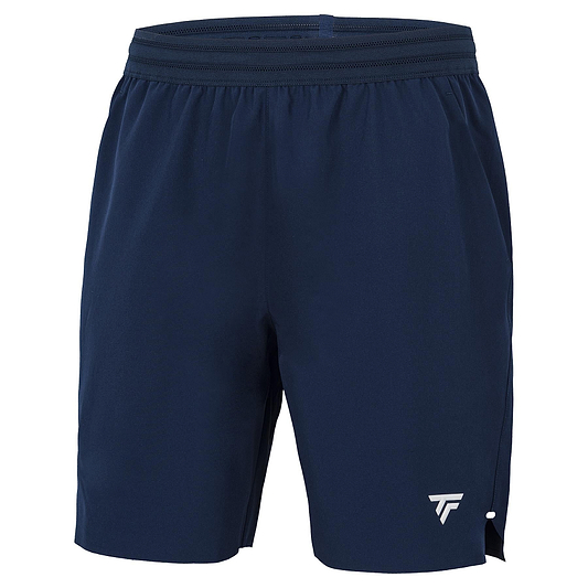 The Tecnifibre Team Stretch Mens Badminton Shorts in marine blue feature an elastic waistband, a small white logo on the left leg, and slight hem slits—perfect for comfort and agility on the court.