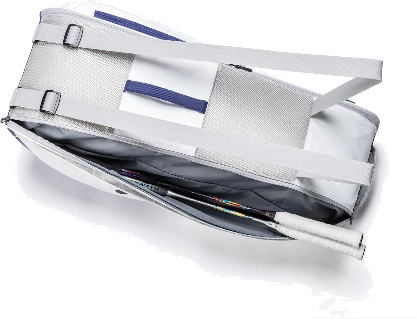 The Yonex BA52526EX Club 6 Racket Badminton Bag in White/Blue is shown open on a white surface, displaying two rackets with white handles inside the main compartment.