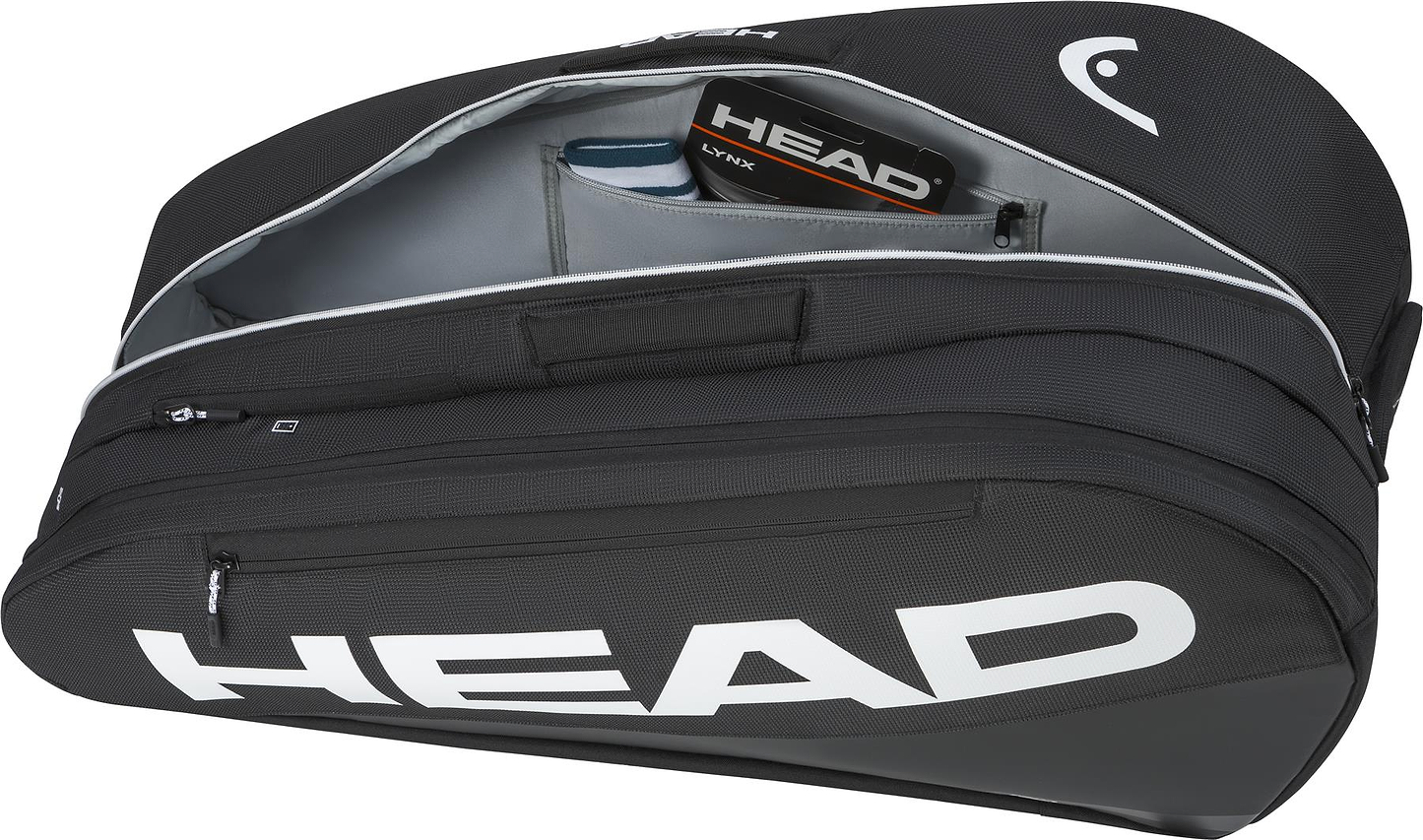 The HEAD Tour 9 Racket Badminton Bag L - Black features a large white HEAD logo, unzipped to show CCT+ climate control compartments, storing a water bottle and HEAD tennis strings.