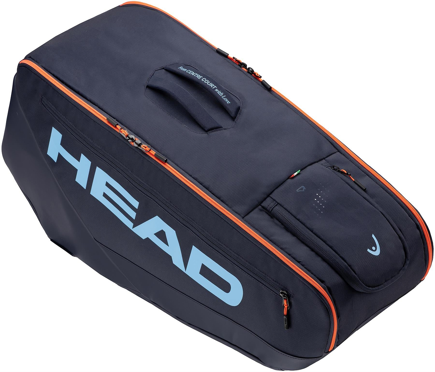 The HEAD Pro 9 Racket Badminton Bag L - Navy features orange zipper accents, a top handle, light blue HEAD logo, CCT+ climate control tech, and multiple compartments including a small top zip pocket; inspired by Jannik Sinner.