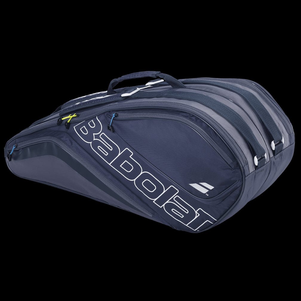 A Babolat Evo Court L racket bag in grey and blue, with multiple compartments and a handle on top, made from eco-friendly recycled PET material, set against a black background.