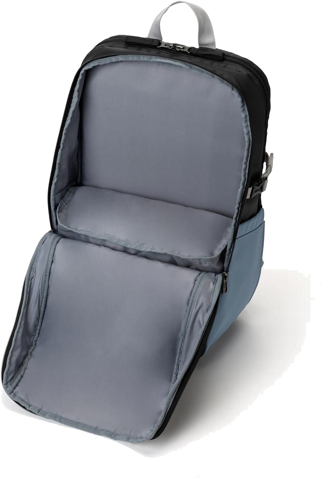 The Yonex BA52512EX Club Badminton Backpack - Black / Blue by Yonex is shown open, highlighting its spacious grey interior and large flap for easy access and packing.