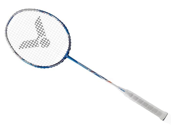The Victor Jetspeed 12 II F Badminton Racket - Blue offers a sleek blue and white design with a comfortable white grip. Crafted by Victor using Pyrofil Carbon fibre, its lightweight Aero-Sword frame is optimized for performance, boasting a string pattern centered around the logo on the racket's head.