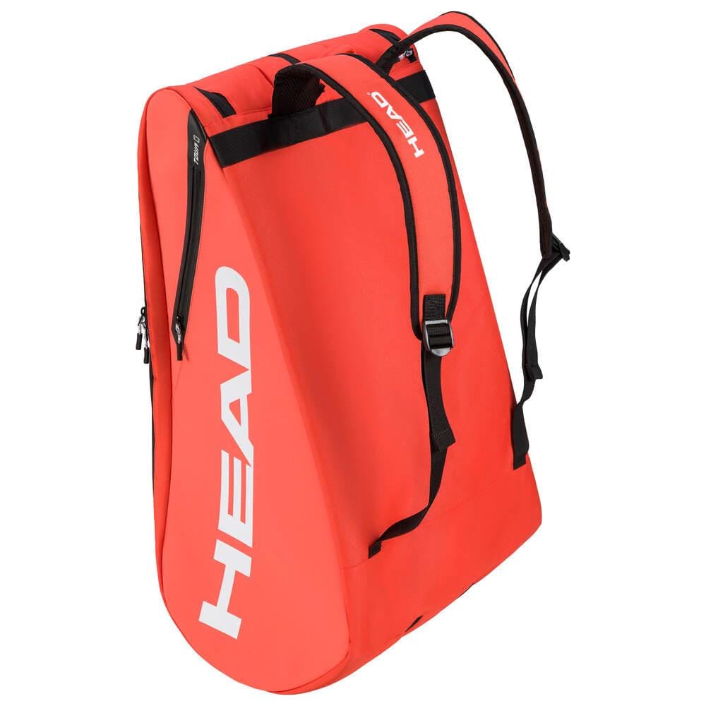 A fluorescent orange, semi-cylindrical HEAD Tour Badminton Racket Bag XL displaying the brand name "HEAD" in white letters on the side. It includes a sophisticated backpack carry system with two black adjustable shoulder straps and a convenient side zipper for easy access.