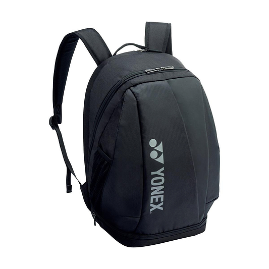 The Yonex 92412MEX Pro Badminton Backpack - Black is a stylish and practical accessory featuring adjustable straps and multiple zippered compartments for convenient organization. It includes dedicated storage for rackets, a shoe compartment, and the Yonex logo elegantly printed on the side in gray.