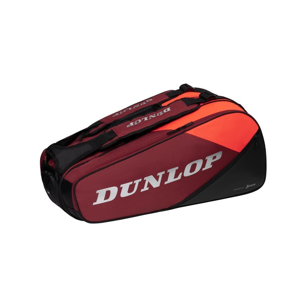 The Dunlop CX Performance 8 Badminton Racket Bag showcases a striking black and red design, equipped with multiple compartments, ergonomic shoulder straps for comfort, and a bold white Dunlop logo on the side.