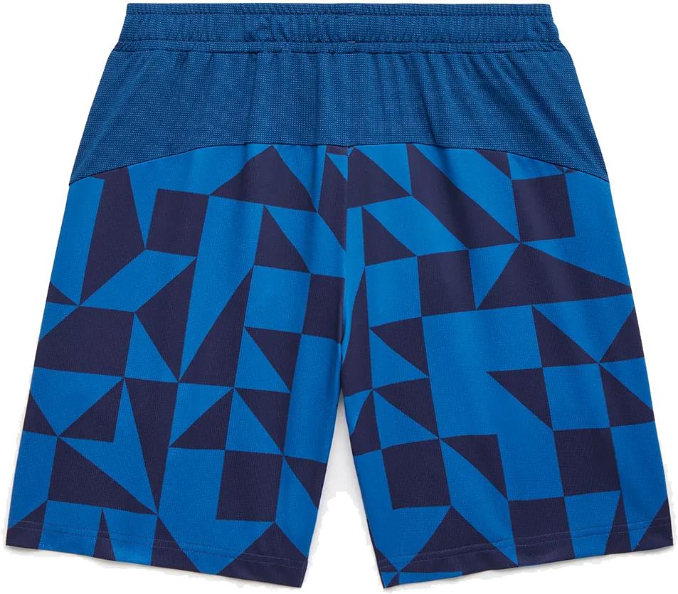 The Yonex 15240YX Knit Men's Badminton Shorts in indigo blue feature an elastic waistband, a geometric dark blue pattern on the lower two-thirds, and a solid blue top. Quick-drying, they are shown laid flat from the back view.