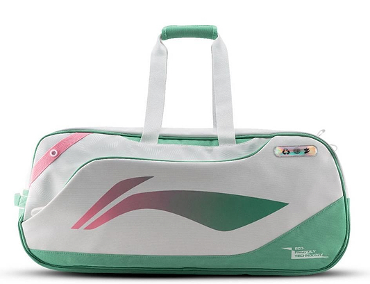 The Li-Ning Competition 6 Racket Badminton Bag in white and green features pink accents, a modern abstract design, sturdy handles, a zipper closure, and a small multicolored tag near the top right corner.