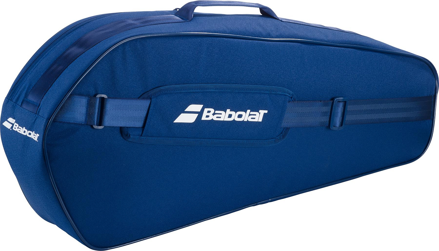The Babolat Court XS 3 Racket Badminton Bag in blue features a zipper, side pocket, top carrying handle, and displays the white Babolat logo on both the side and pocket.