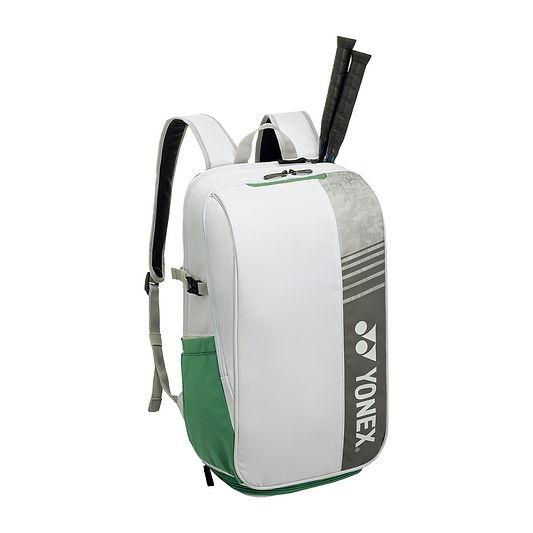 The Yonex 52512EX Club Badminton Backpack in white, designed for tennis and badminton gear, features gray accents, adjustable shoulder straps, and fits two racquets sticking out from the top. Lightweight yet durable, it's ideal for athletes on the go.