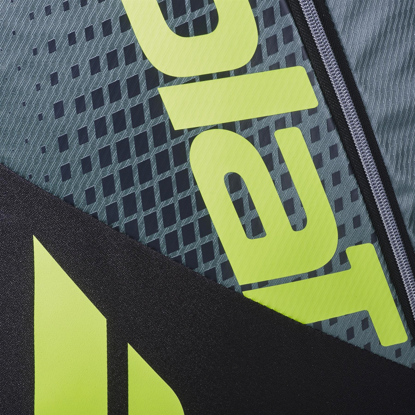 Close-up of the Babolat RH6 Pure Aero 6 Racket Badminton Bag in grey and yellow, showcasing textured panels, bold yellow branding, and a stylish zipper detail from Babolat.