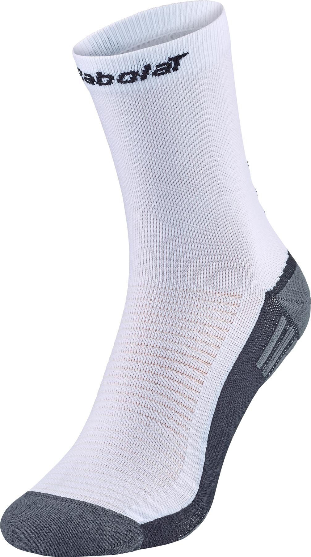 The Babolat Mid-Calf Badminton Socks in white with black logo offer ribbed support and gray heel/toe accents—ideal for badminton players seeking comfort and style.