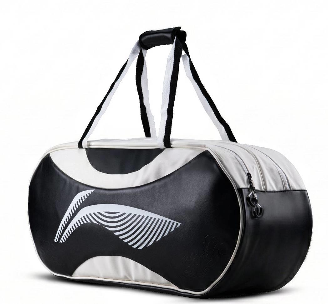 The Li-Ning Competition 6 Racket Badminton Bag in white and black features double handles, a zippered top, and a modern abstract side design. This stylish Li-Ning bag is displayed against a plain white background.