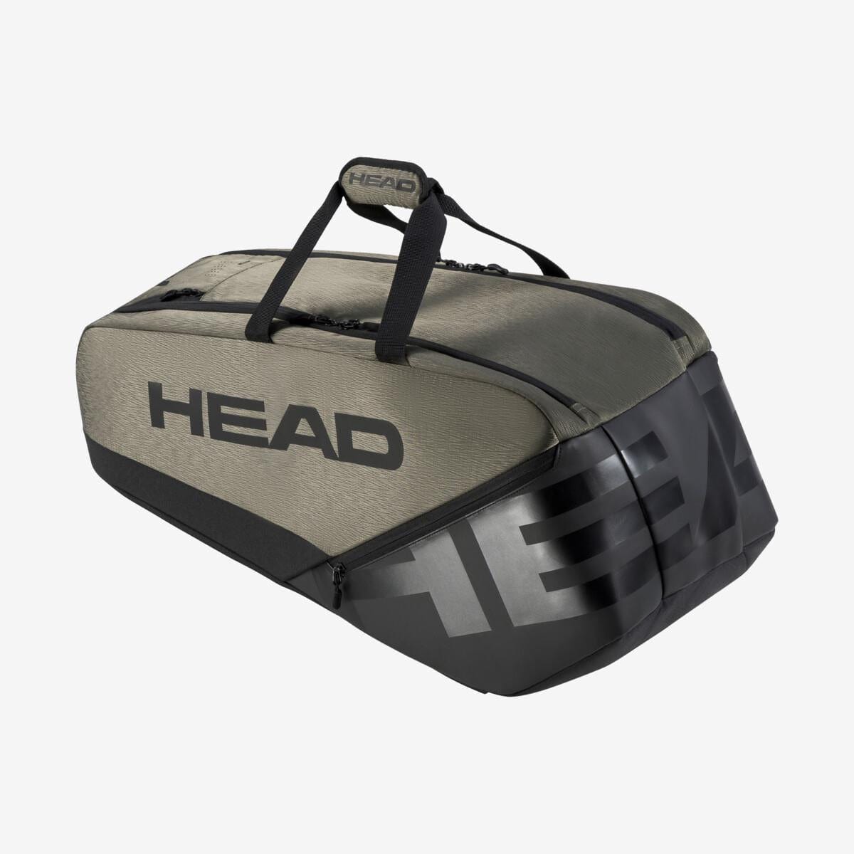 Introducing the HEAD Pro X Badminton Bag L - TYBK, a stylish gray and black carrier emblazoned with "HEAD." This contemporary design is equipped with two durable handles and provides ample storage for badminton rackets. It also features CCT+ Climate Control Technology to keep your gear in excellent condition.