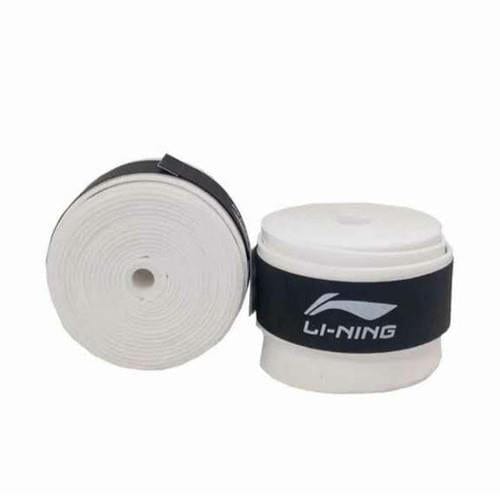 Displayed are two rolls of the Li-Ning Badminton Overgrip (3 Pack) in white. One roll is positioned upright, while the other is laid flat. Each roll is secured with a black band that prominently features the Li-Ning logo, emphasizing their super tacky quality against a plain white background.