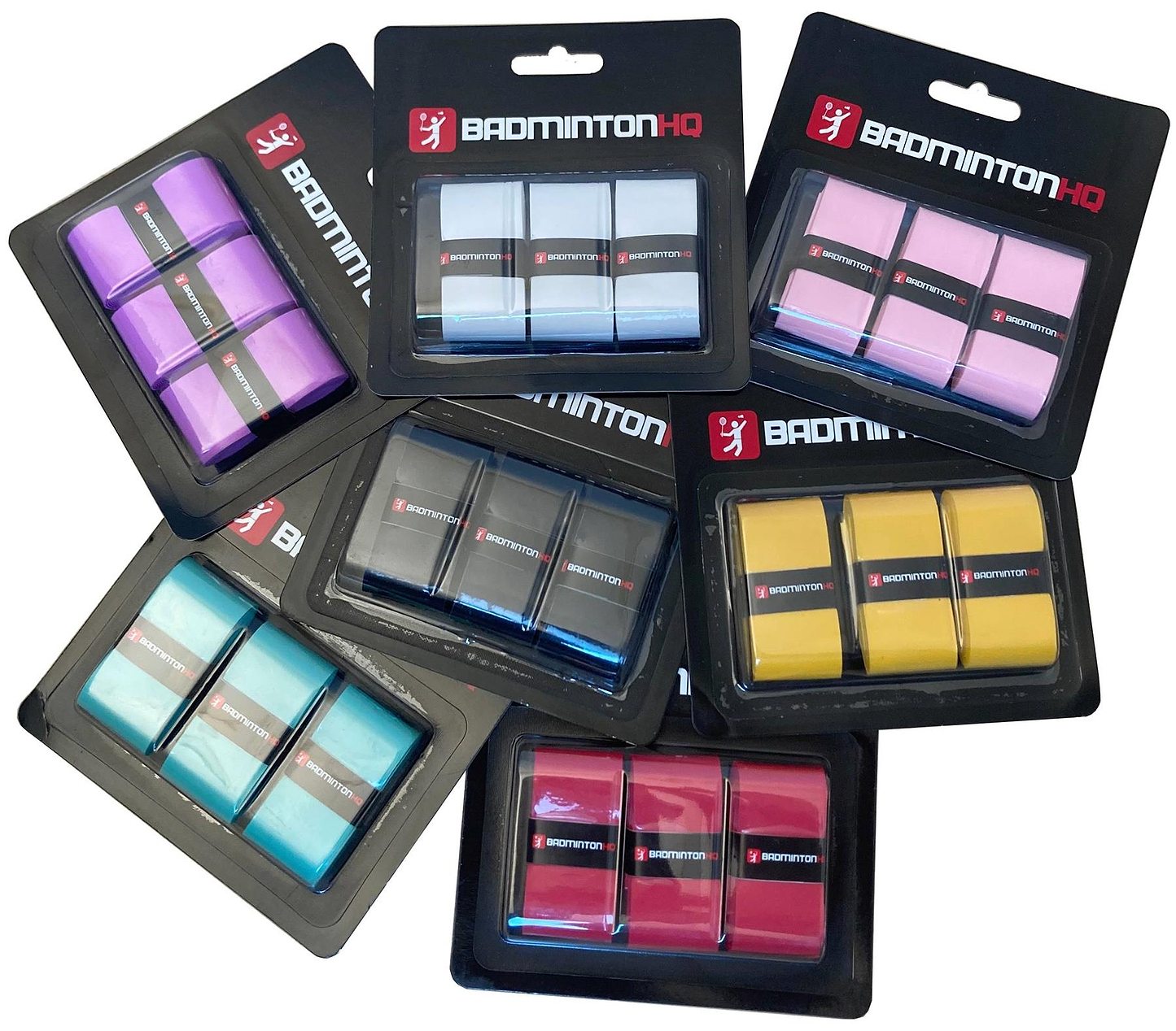 Multiple BadmintonHQ 3 Pack Badminton Overgrips—each pack includes three ultra-tacky grips in red, purple, blue, black, yellow, or pink—are shown overlapping in clear plastic packaging.