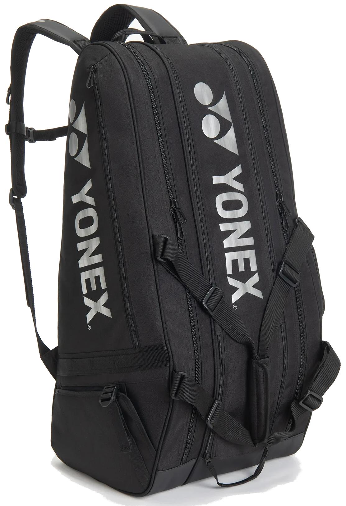 The Yonex BA72629EX Gearlogic 9 Racket Badminton Bag in black features multiple zippered compartments, shoulder straps, and white Yonex branding—perfect for serious players seeking ample storage.