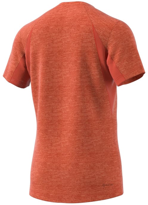 A short-sleeved red badminton t-shirt displayed from the back, featuring a heathered texture and raglan sleeves, designed with adidas Mens Freelift technology for optimal comfort.