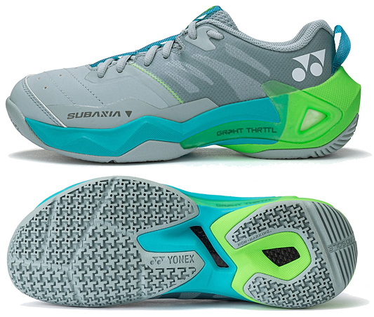 A pair of Yonex Subaxia GT 2026 Women's Badminton Shoes in grayish green is shown from the side and bottom; featuring Yonex branding on the side and a textured sole with GRPHT THRTTL technology for improved grip.