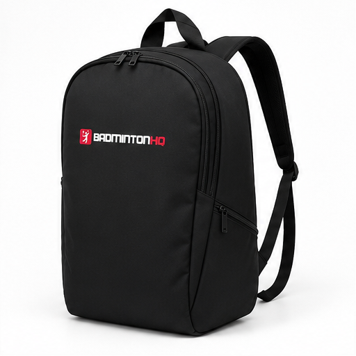 The BadmintonHQ Badminton Backpack - Black features a front zipper pocket, adjustable straps, "BADMINTON HQ" in white/red, and a small red logo—perfect for carrying your badminton kit.