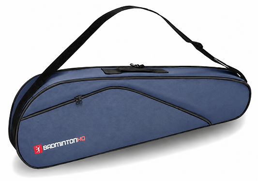 The BadmintonHQ 3 Racket Badminton Bag - Blue features black trim, zippered compartments, a black shoulder strap, and displays the "BADMINTON HQ" logo in white and red on the front.