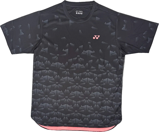 The Yonex YTM2025B Men's Badminton T-Shirt in black features a subtle geometric pattern, rounded neckline, small pink Yonex logo on the left chest, and pink fabric lining inside the bottom hem.