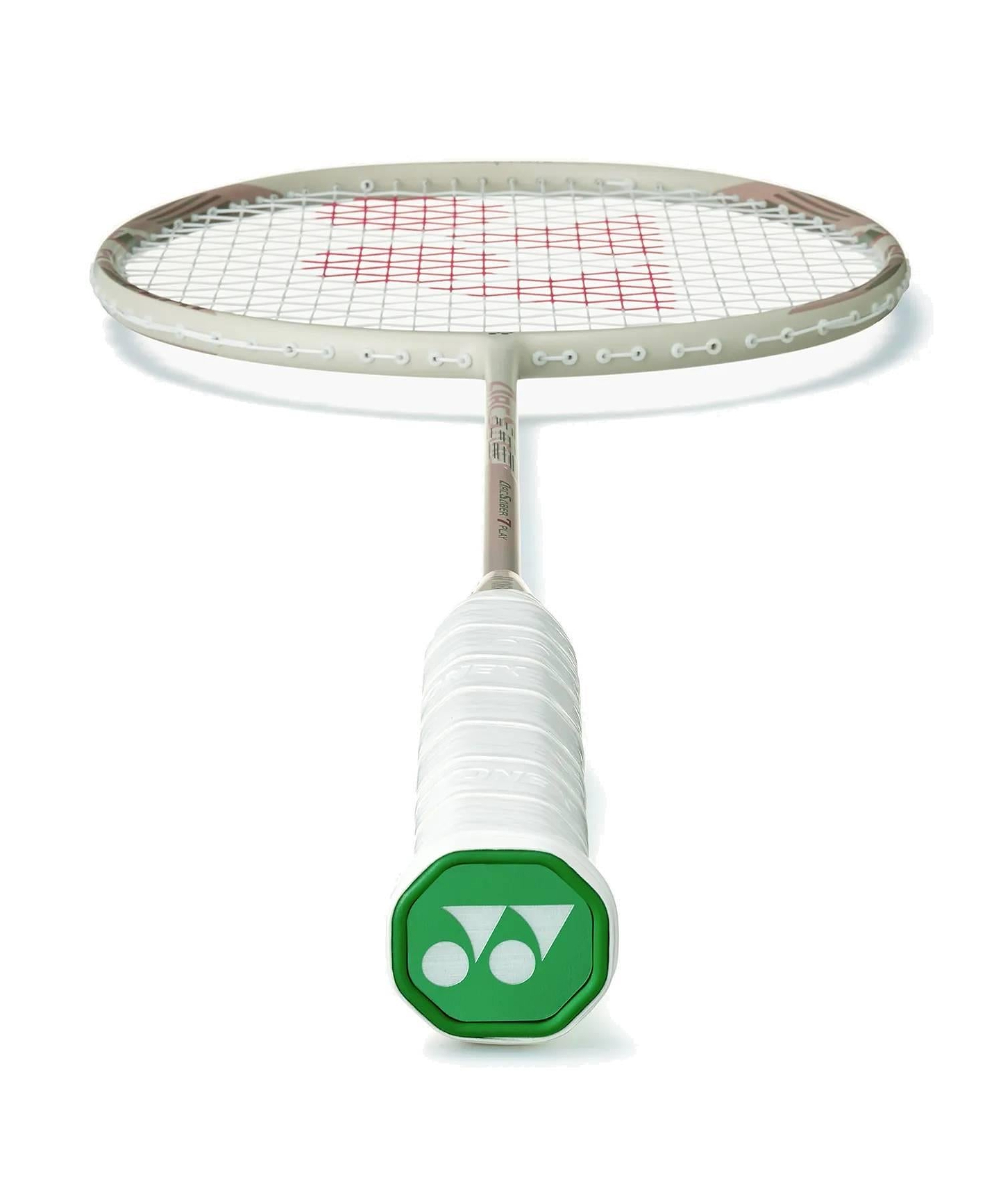 A Yonex Arcsaber 7 Play 4U Badminton Racket - Light Beige is shown lying flat with the handle facing the camera, highlighting its green end cap, white grip, and distinctive ISOMETRIC frame design in the background.
