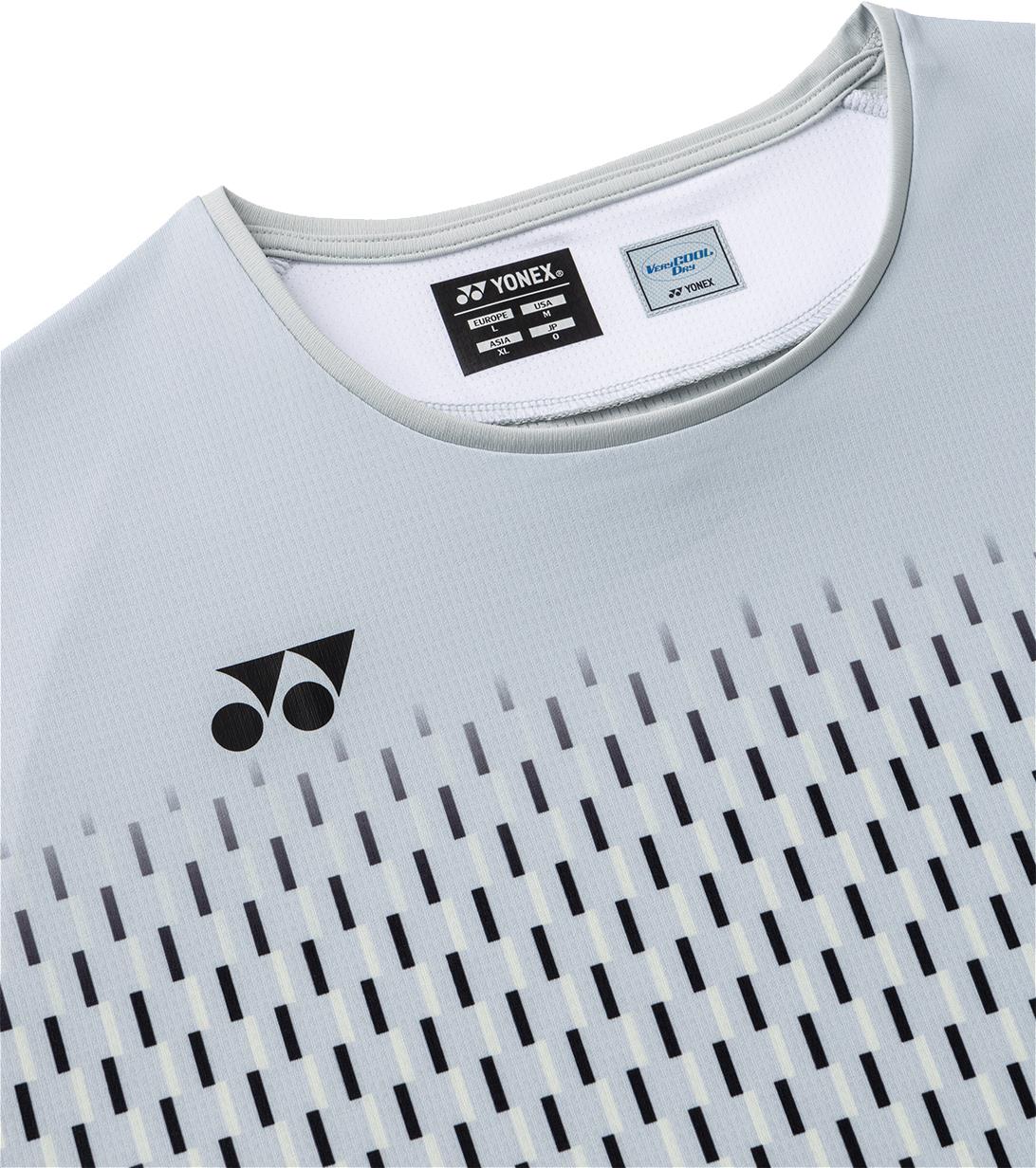 Close-up of the Yonex 10713EX Crew Neck Men's Badminton T-Shirt in Silver Grey, showing a black Yonex logo on the chest, vertical black and white lines, and garment tags at the neckline.