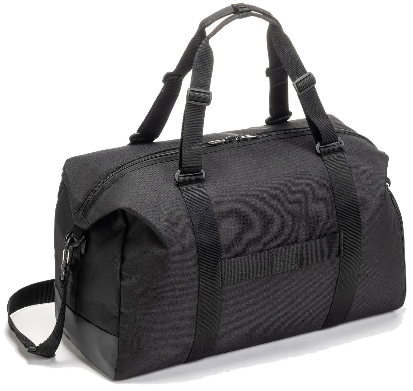 The Yonex BA72611EX Gearlogic Badminton Boston Bag in black features recycled polyester, two handles, an adjustable shoulder strap, and a zippered main compartment, shown against a white background.