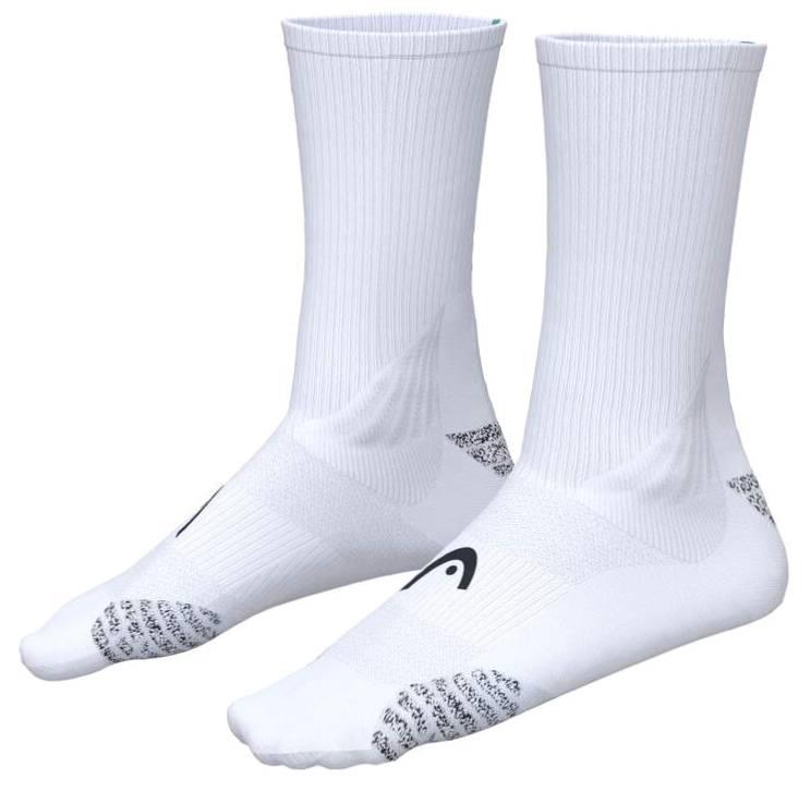 The HEAD Colour Crew Badminton Socks in white and turquoise feature ribbed uppers, textured soles, zonal cushioning, and a small black HEAD logo near the toes, shown on an invisible foot model.