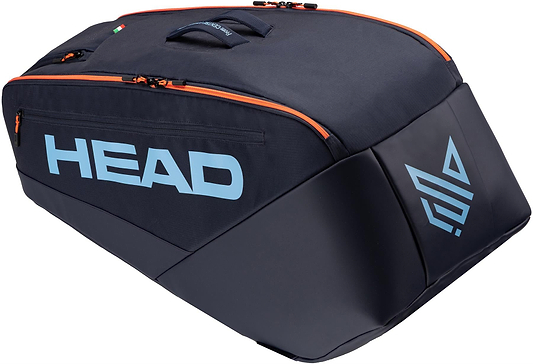 The HEAD Pro 9 Racket Badminton Bag L in navy features orange zippers, bold blue "HEAD" branding, a geometric logo, top handle, CCT+ climate control tech, and a sleek, angular design inspired by Jannik Sinner.