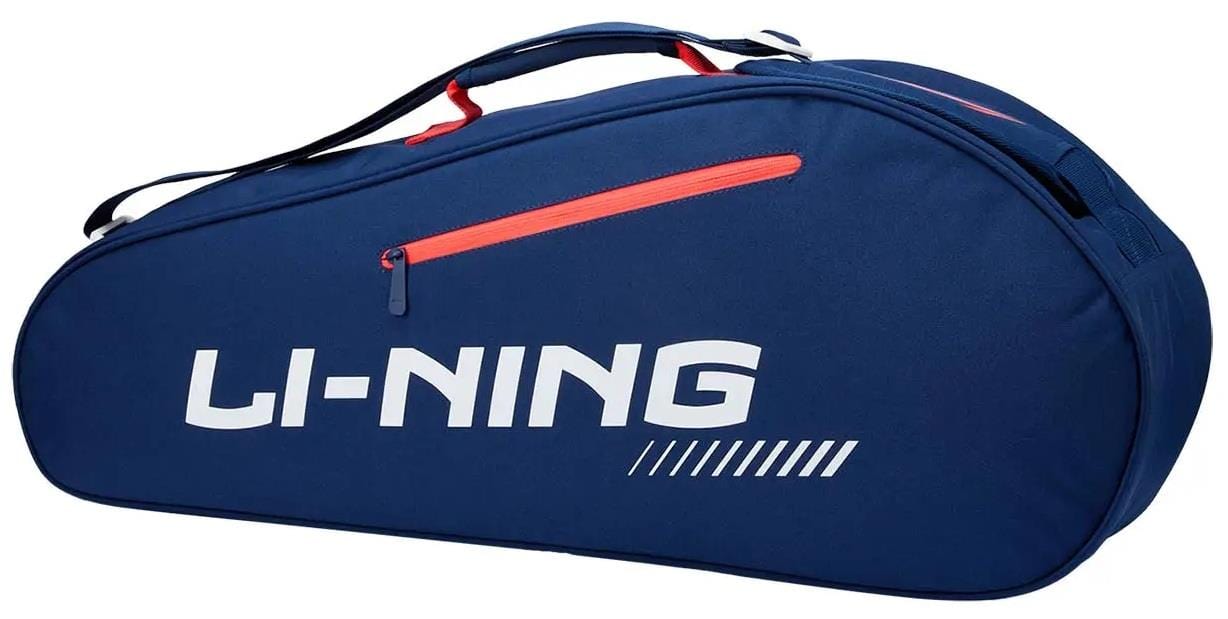 The Li-Ning Training Series 3 Racket Badminton Bag in blue/red is a versatile sports bag designed to carry rackets and equipment, featuring a black shoulder strap and red zipper pocket.